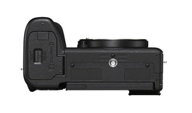 Sony Alpha 6700 with 18-135mm zoom lens emphasizes travel versatility.