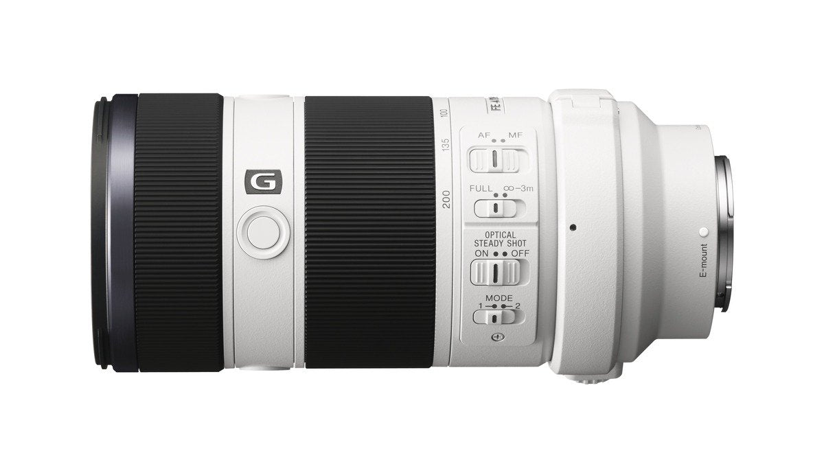 Lens with tripod mount and weather sealing for outdoor photography