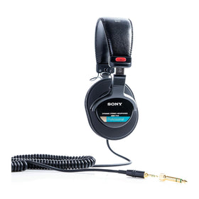 Sony MDR-7506 folded compact for travel, demonstrating portable design and easy storage