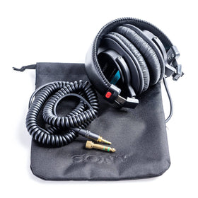 Sony MDR-7506 with 1/4 inch adapter plug illustrating studio connectivity and compatibility