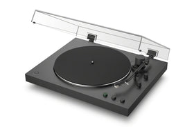 Sony PS-LX3BT turntable with clear dust cover protecting records.