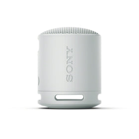 Sony SRS-XB100 in backpack cupholder showing travel-ready compactness benefit