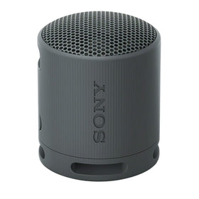 Sony SRS-XB100 side with strap highlighting portability and clip