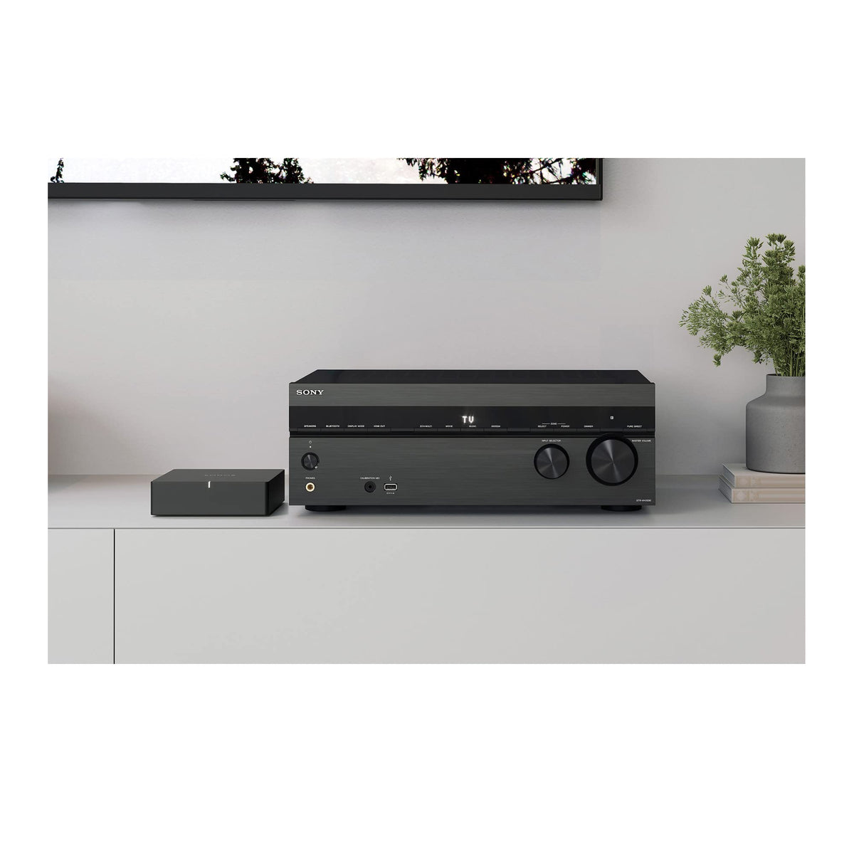 Sony STR-AN1000 remote control facilitates quick setup and playback control.