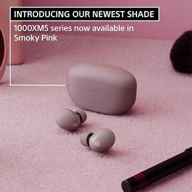 Sony WF-1000XM5 earbuds worn in ear, snug fit and discreet profile.