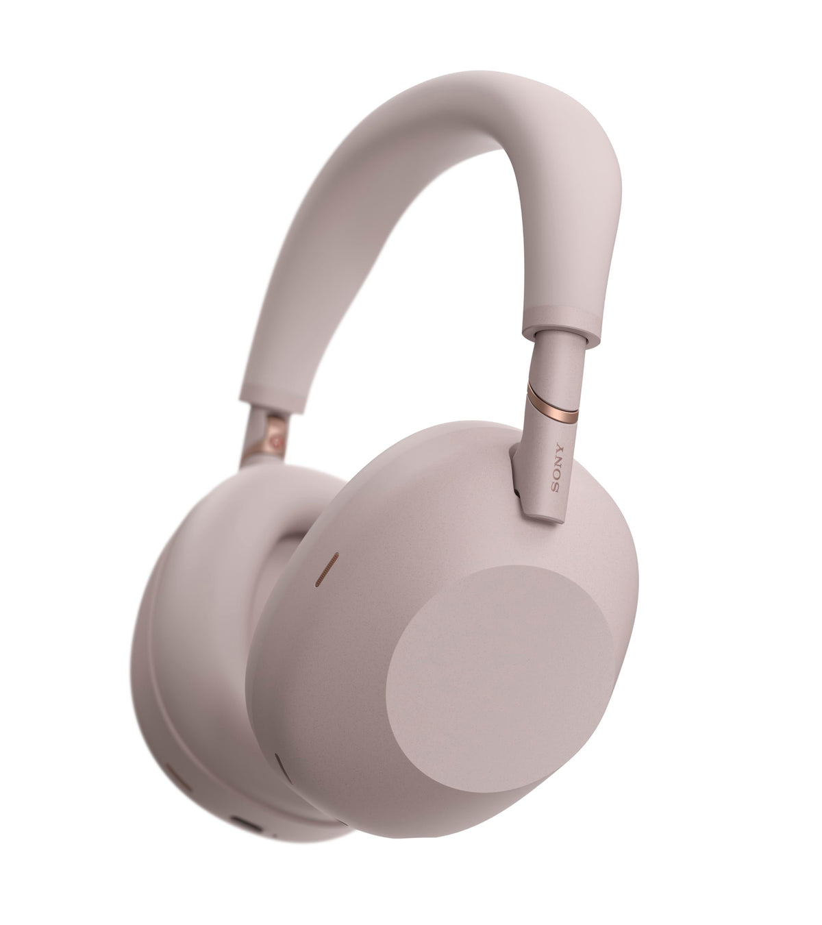 Sony WH-1000XM6 headphones on ear with sand pink finish for immersive listening