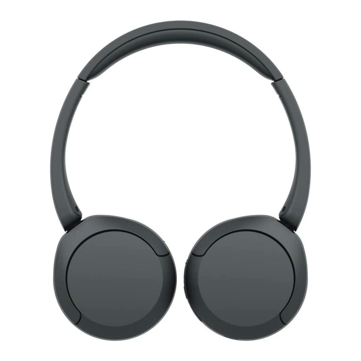 Person wearing Sony WH‑CH520 on commuter train for comfortable all‑day use