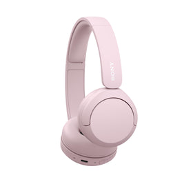 Sony WH-CH520 pink in hand for size scale and travel-friendly benefit