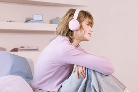 Sony WH-CH520 pink packaging and cable showing included USB-C charger