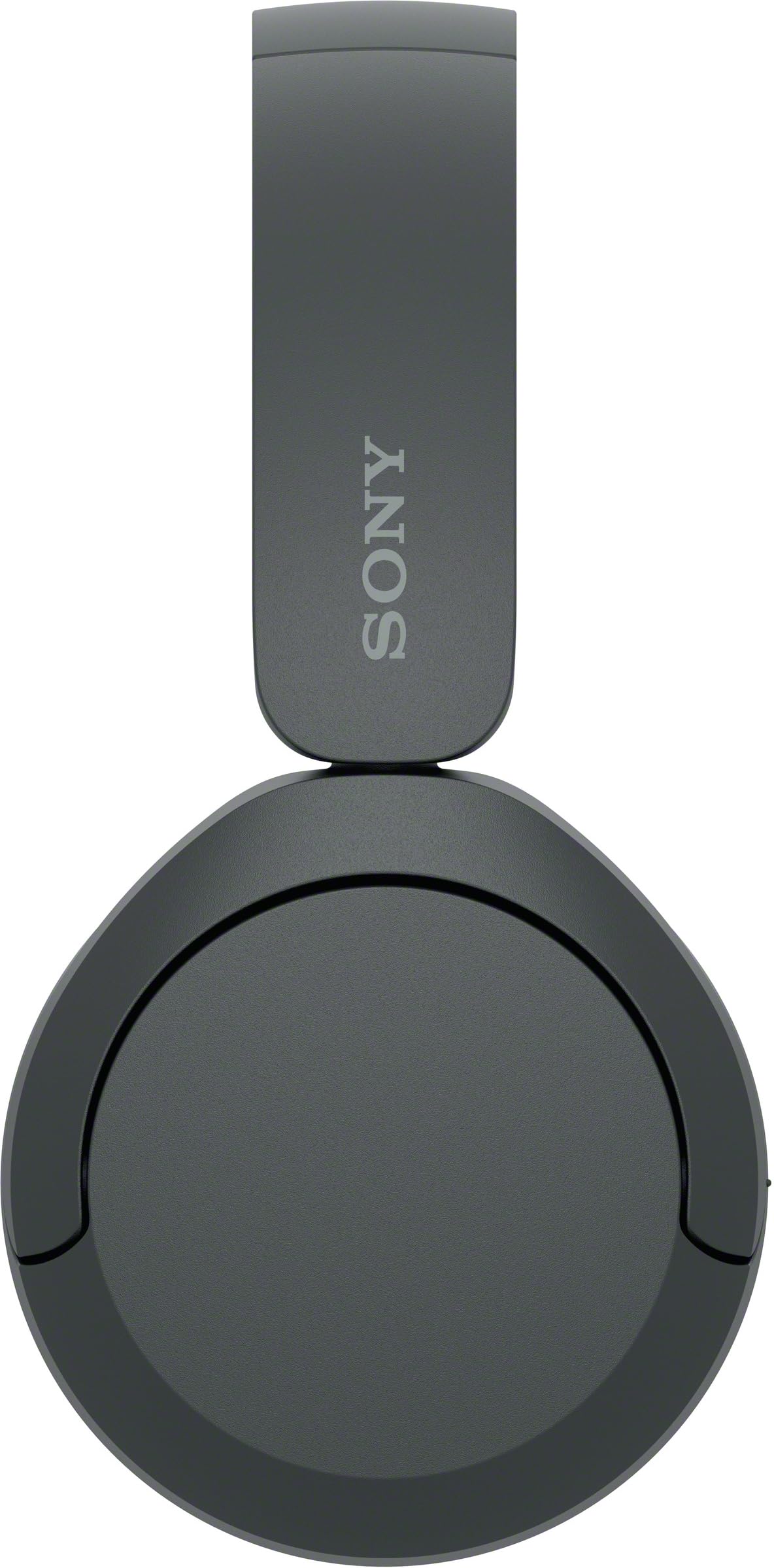 Sony WH-CH520 worn on commuter demonstrating lightweight portability benefit