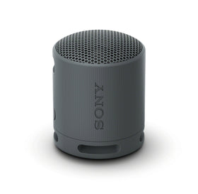Sony SRS-XB100 front view showing compact speaker and grille, ideal for travel