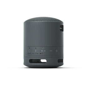 Sony SRS-XB100 clipped to backpack, durable and dustproof for adventures