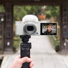 Sony ZV-1 camera side shot highlighting portable form factor for travel shoots.