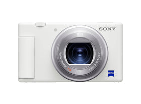 Sony ZV-1 in hand during a vlog emphasizes stabilized footage on the move.