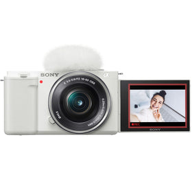 Sony ZV-E10 front cap protecting the lens during on-the-go filming.