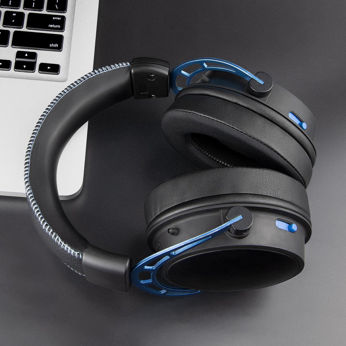 Full black design matches HyperX headsets and hides wear.