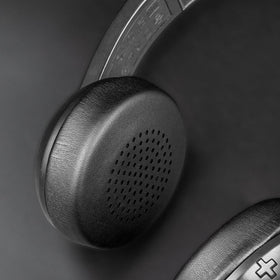 SOULWIT lifestyle shot on commuter using headphones for all-day comfort benefit