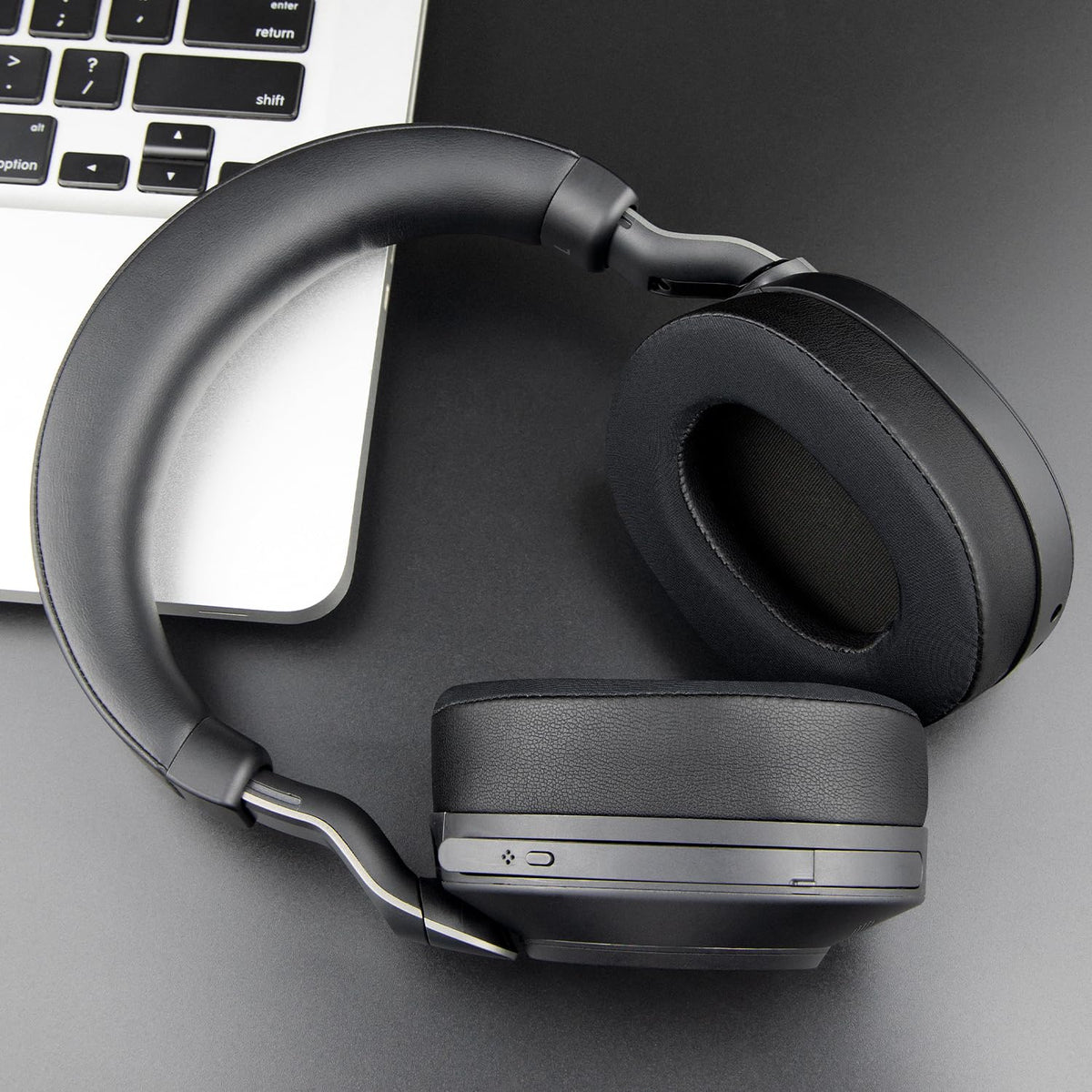 Compact packaging includes replacement earpads and foam