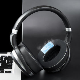 SOULWIT lifestyle image of a user wearing headphones in a cafe to show comfort during long sessions
