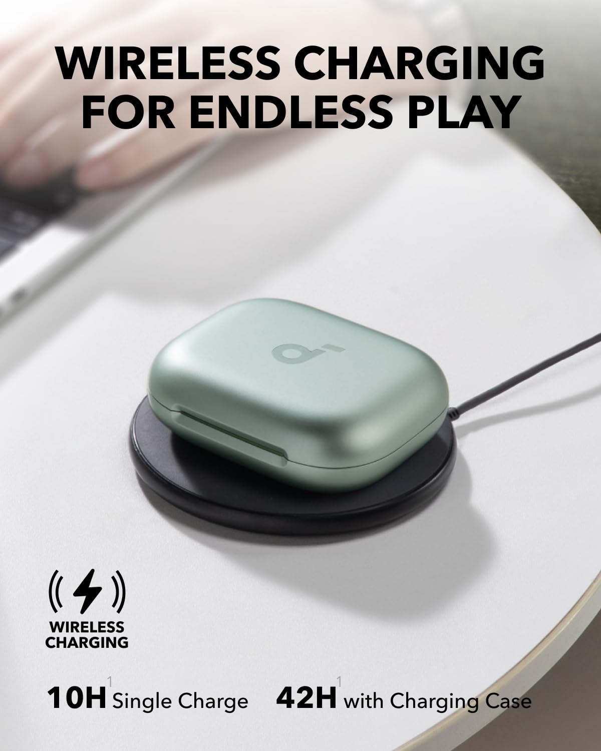 Soundcore AeroFit 2 charging case beside headphones illustrating 42‑hour playtime