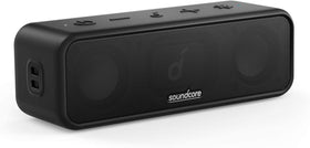 Soundcore front view showing compact speaker and logo for portable listening
