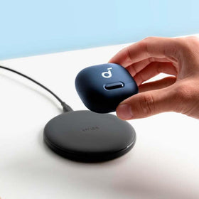 Soundcore Liberty 4 NC earbuds worn on ear for immersive listening fit.