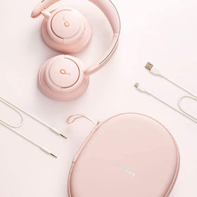 Soundcore Life Q30 on travel luggage indicating ideal travel noise reduction benefit