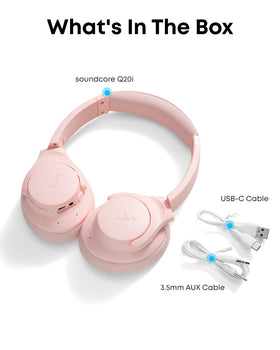Soundcore Q20i held in hand to show scale and lightweight travel convenience