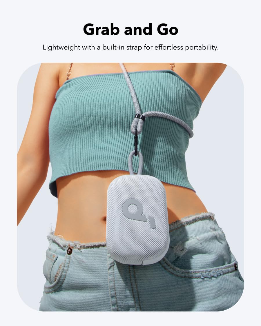 Soundcore Select 4 Go attached to backpack strap with included strap, portable convenience benefit