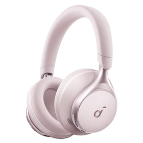 Soundcore Space One headphones resting on table, showcasing travel-ready design.