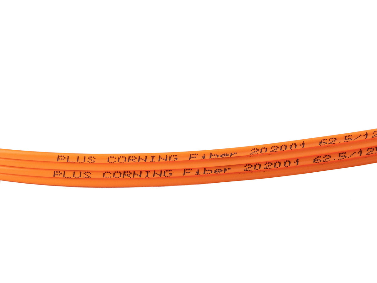 SpeedyFiberTX cable in use between switch and SFP showing tidy routing benefit