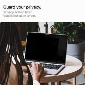 Spigen SafeView magnetic frame attaching to MacBook Pro for fast installation