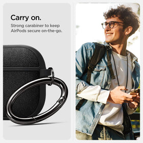 Spigen Urban Fit with carabiner clipped to backpack loop for secure carry benefit
