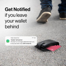 Spotminders PRO tucked into wallet showing invisible protection for everyday travel