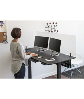 Stand Up Desk Store 51-inch tray, full-width cable organization for your desk setup.