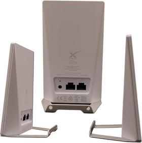 Starlink Router Mini on its stand saves desk space and improves airflow.