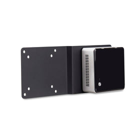 Bracket attaches to monitor back, freeing desk space and reducing clutter.