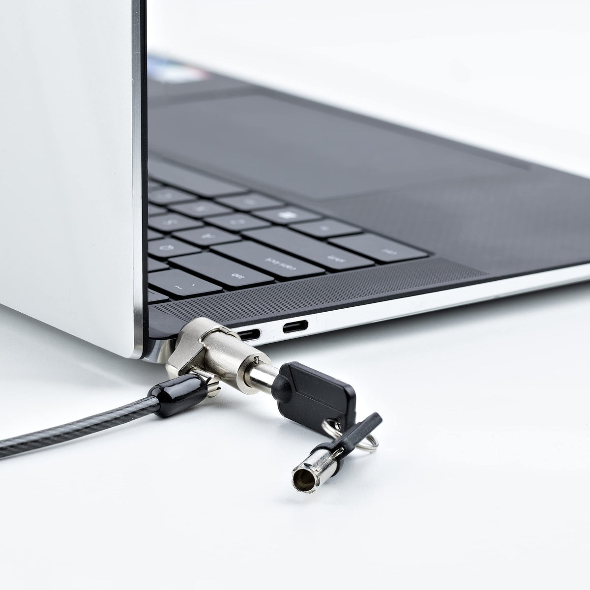StarTech.com pair of zinc-alloy keys and storage strap showing easy access