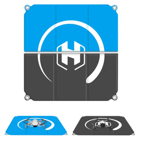 STARTRC PHOTO drone landing pad foldable 22in for stable takeoff on uneven ground.