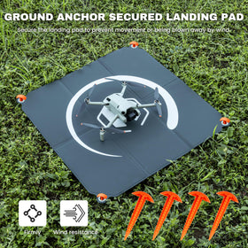 STARTRC PHOTO weighted pad stays put in wind while you prep your drone.