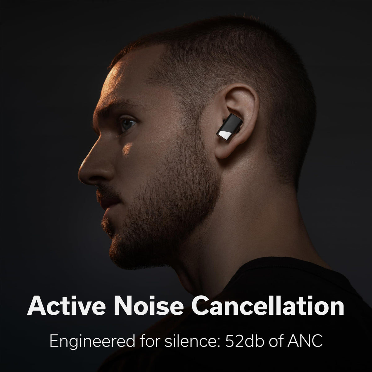 Status Pro X earbuds outside case, sleek and ready for listening