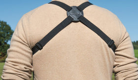 Steiner harness worn by birdwatcher demonstrating hands-free viewing advantage