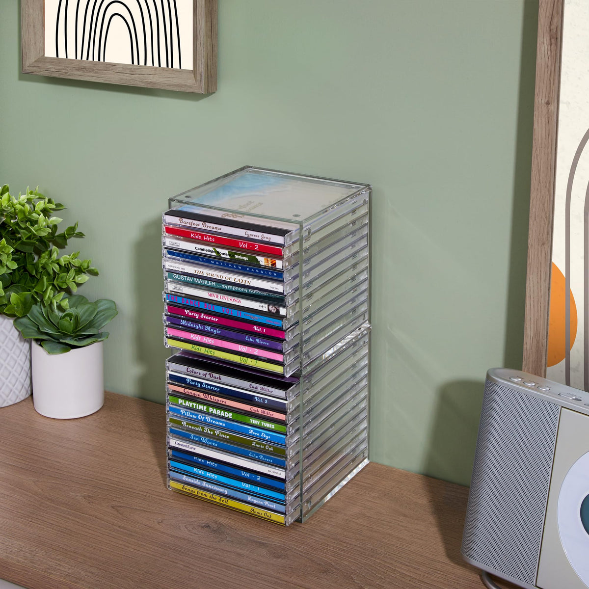 STORi stackable design with circular feet provides stable storage for media.