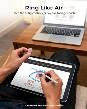 Stouchi ring in hand for scale, brand shows compact lightweight portability
