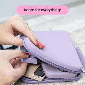 Size comparison of Strapsicle clutch with popular e-readers for a secure fit.