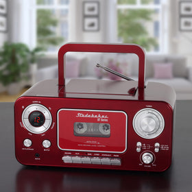 Studebaker portable boombox with handle carried outdoors showing easy transport benefit
