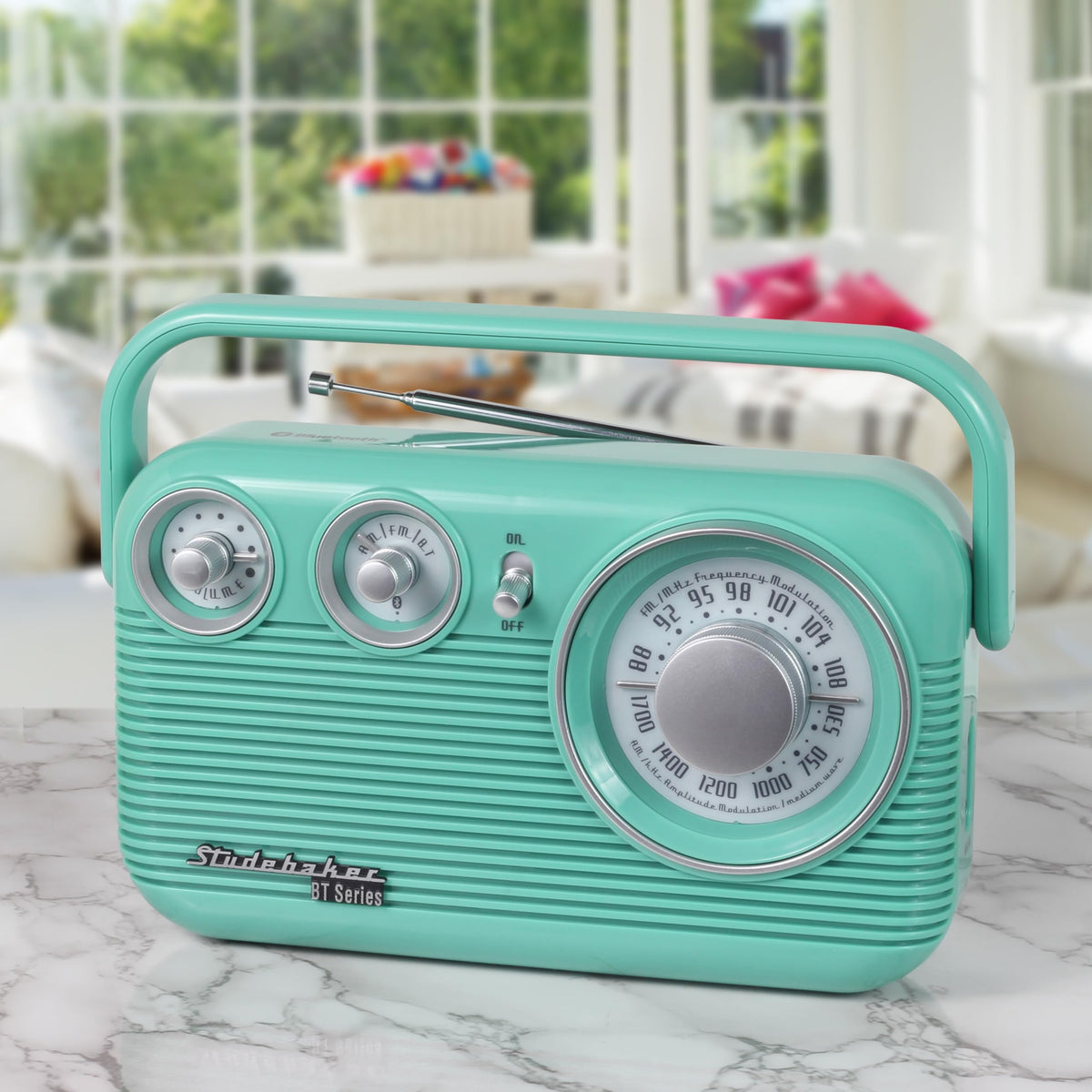 Studebaker radio on picnic table showing Bluetooth streaming and battery convenience