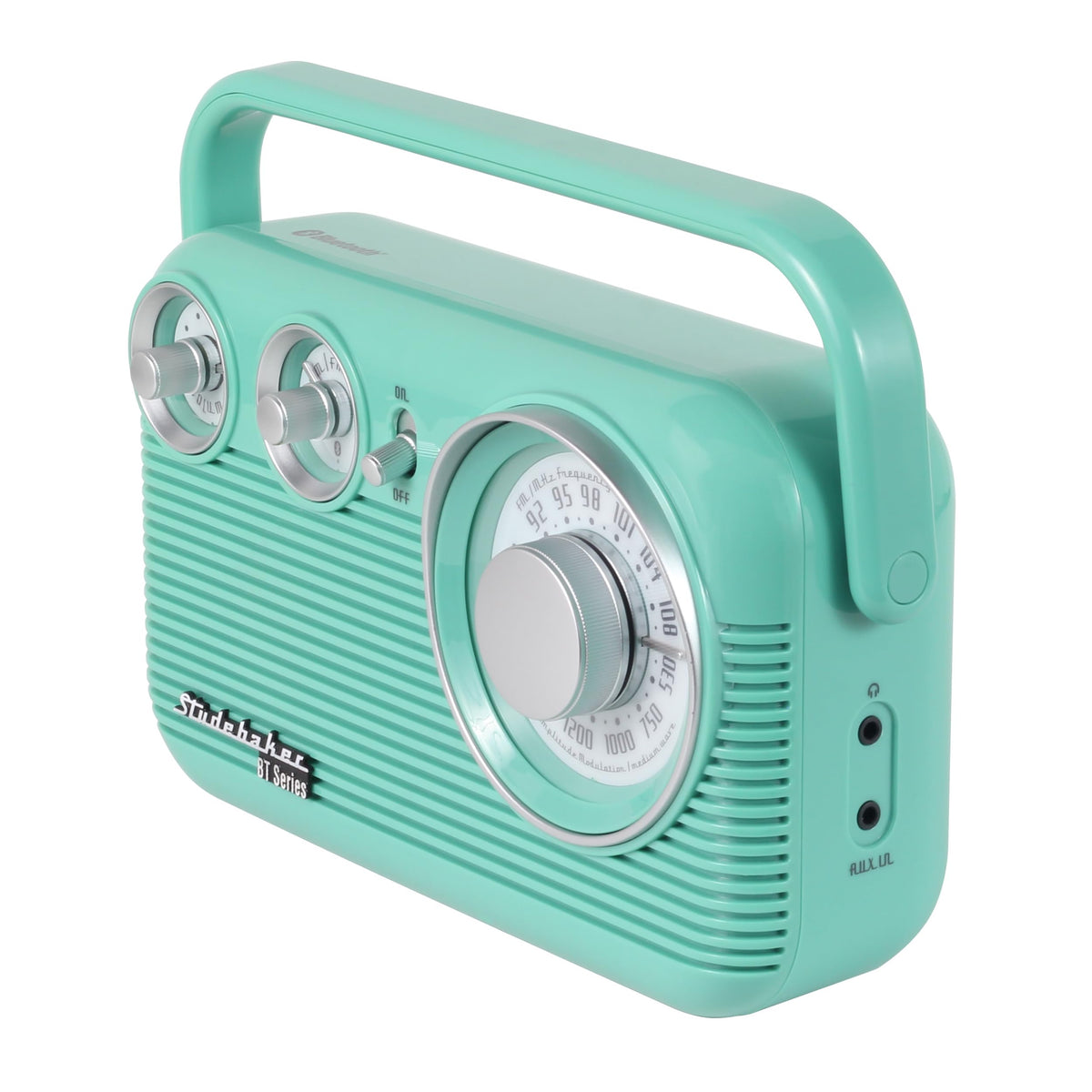 Studebaker radio in hand demonstrating compact size and easy portability