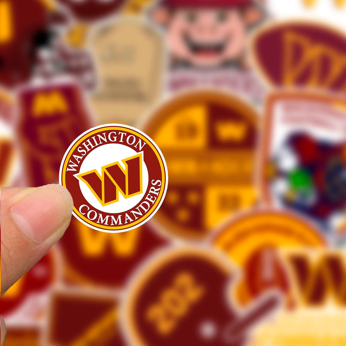 SUNSAIL Washington Commander stickers on laptop; scratch-resistant decals for travel and study.