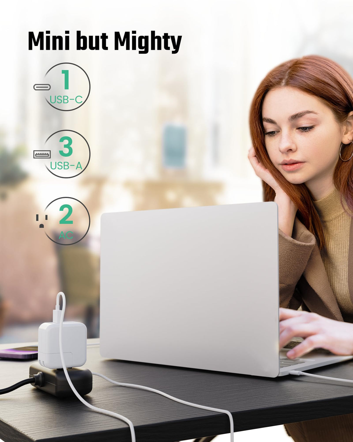 SUPERDANNY compact travel power strip fits neatly on a desk or bag.